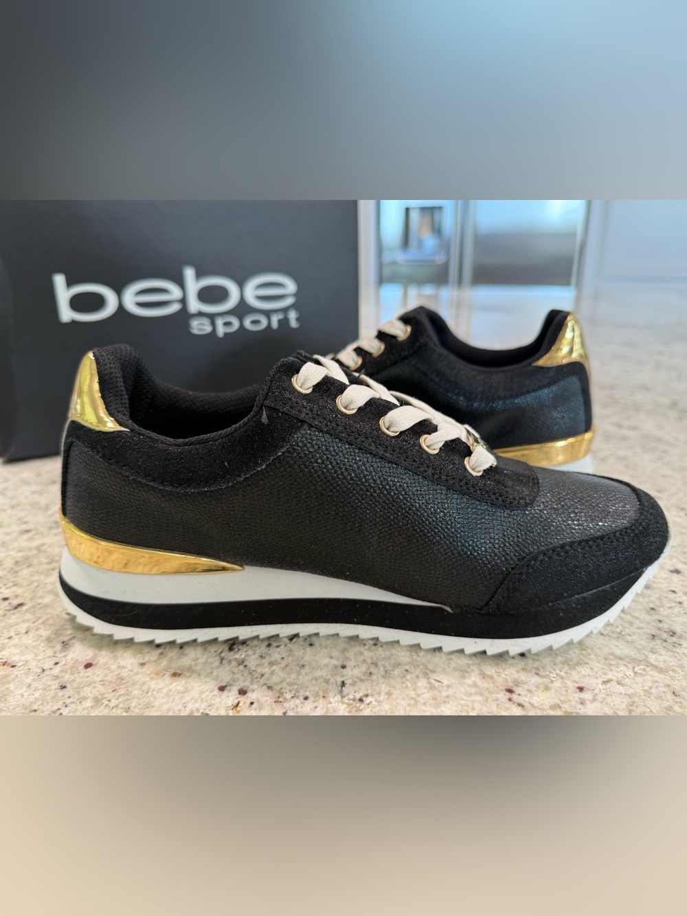 Gorgeous bebe sport black with gold accents Lace-Up Sneakers NWOT
